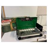 Coleman. Propane cookstove. Looks unused.