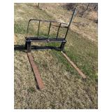 Pallet fork for a skidsteer