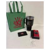 Cell phone charger. Yeti Mug. Phone stand