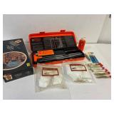 Gun cleaning kit with different cal brushes.