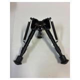 Rifle bipod stand.