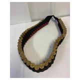 12 gauge. 47 Reloaded 2 3/4' shells  canvas belt