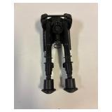Rifle bipod stand.