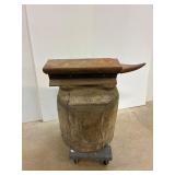 Homemade anvil on anvil block.