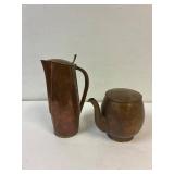 Copper pots. Look hand forged