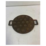 Cast Iron mini pancake pan.