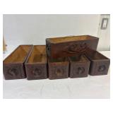 6 sewing machine drawers.