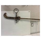 B. S. &. M. 100 pound beam scale.