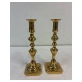 Brass candlestick holders. 10' tall