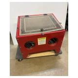 Sand blasting cabinet.