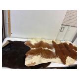 3 small cow hides.