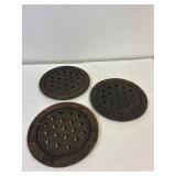3 cast iron floor drain grates.