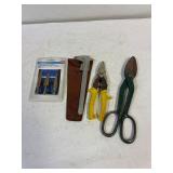 Step drill bits. Caliper. Tin snips.