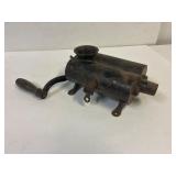 Cast iron sausage stuffer.