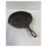 T. Eaton Co. No 8  cast iron fry pan.