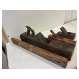 Wood planes and level.