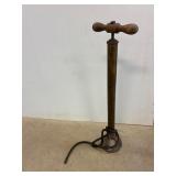 Brass tire pump. Needs a new hose.