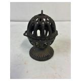 Cast iron string holder.