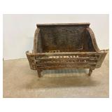 Cast iron log basket for a fireplace. 17 x12 x15'H