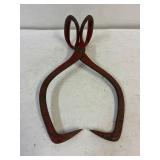 Ice tongs.
