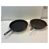 2 cast iron fry pans.