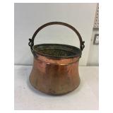 Copper looking caldron. 9 deep 13' across