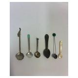 Tiny spoons.  for sampling.