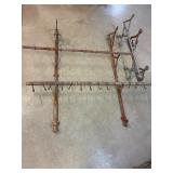 Brackets and bars for smoking meat.