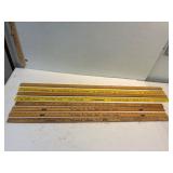 Wood metre and yard sticks.