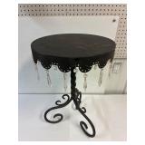 Decorative metal table. 24' high   15 3/4' across