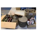 lot of bottles, tins and sign pieces
