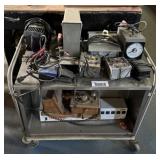 cart with electrical testers and equipment