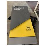 Towson University sign on pole