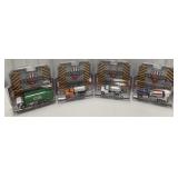 Lot of 4 1/64 Green Light SD Trucks