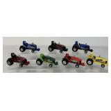 1/64 (7) Ertl Puller Tractors