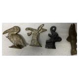 4 cast iron figural bottle openers