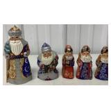 5 hand painted Russian Santa wood carvings