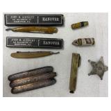 razors, razor boxes, flask, level, opener, etc.