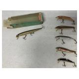 6 fishing lures ( 1 Heddon, 1 Rapala, 4 Rebel)