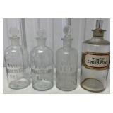 4 druggist bottles