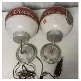 pair of Coors wall sconces