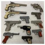 11 toy guns, not all working