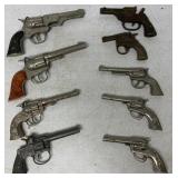 9 cast iron and die cast cap guns, not all working