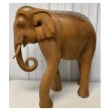 large solid wood carved elephant