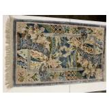40" X 24" floral motif rug