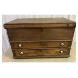 chest full of sewing and craft supplies