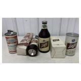 Schlitz flashlight, radio, and coasters as well as