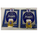 2 Pabst advertising signs