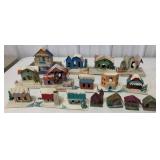 assorted Christmas village and ornament houses