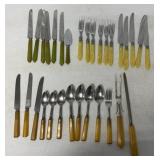 25+ pieces of bakelite handle flatware